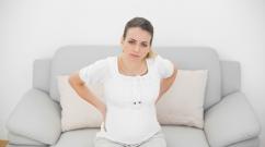 Причины боли в копчике во время беременности и способы ее устранения Основные причины резких болей ощущаемых в копчике во время беременности